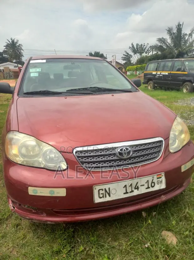 Toyota Corolla 2006 Red · Photo 1