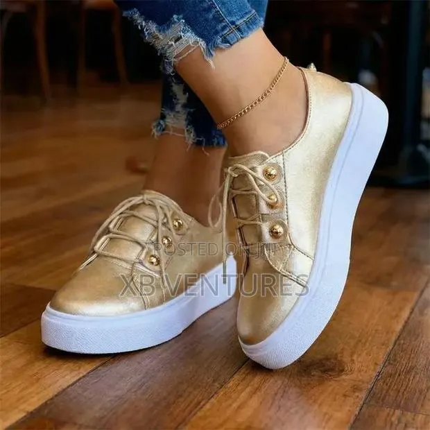 Gold and White Casual Sneakers - Women · Photo 1