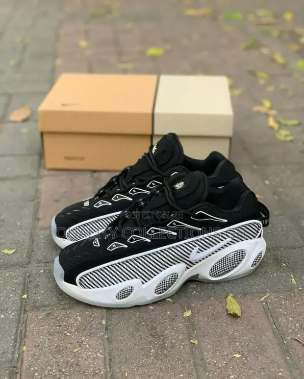 Nike Nocta Glide Black and White · Photo 1