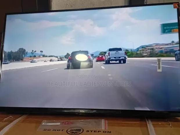 TCL 32-Inch Television With Immersive Sound Display · Photo 1