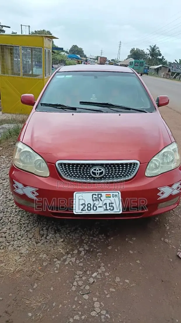 Toyota Corolla 2010 Red · Photo 1