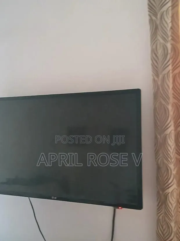 LG Flat Screen 50 +" TV · Photo 1