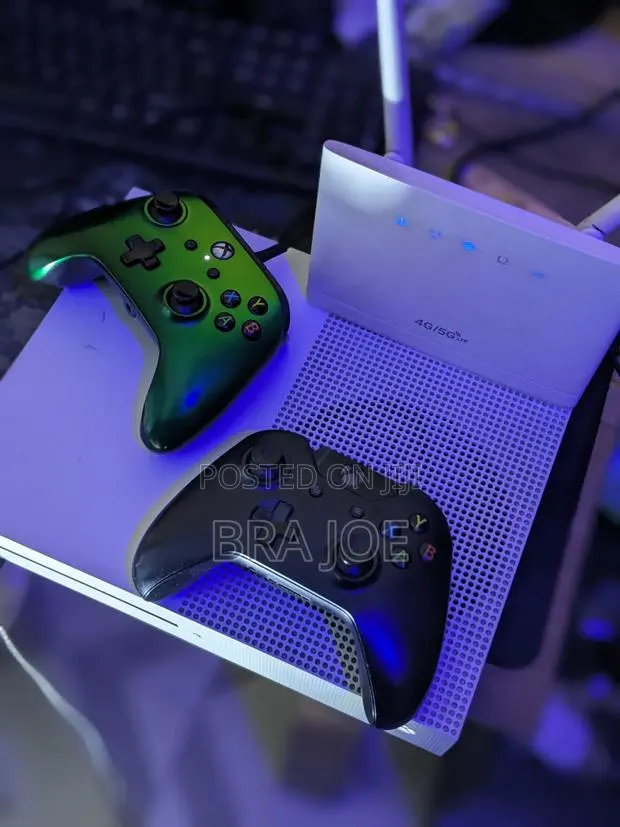 XBox One S With Games and Controllers · Photo 1