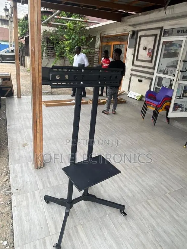 Experience Glamorous Versatility With the Mobile Trolley Tv Stand · Photo 1