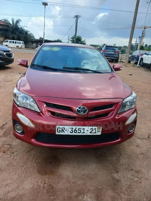 Toyota Corolla LE 4dr Sedan (1.8L 4cyl 4A) 2012 Red · Photo 1