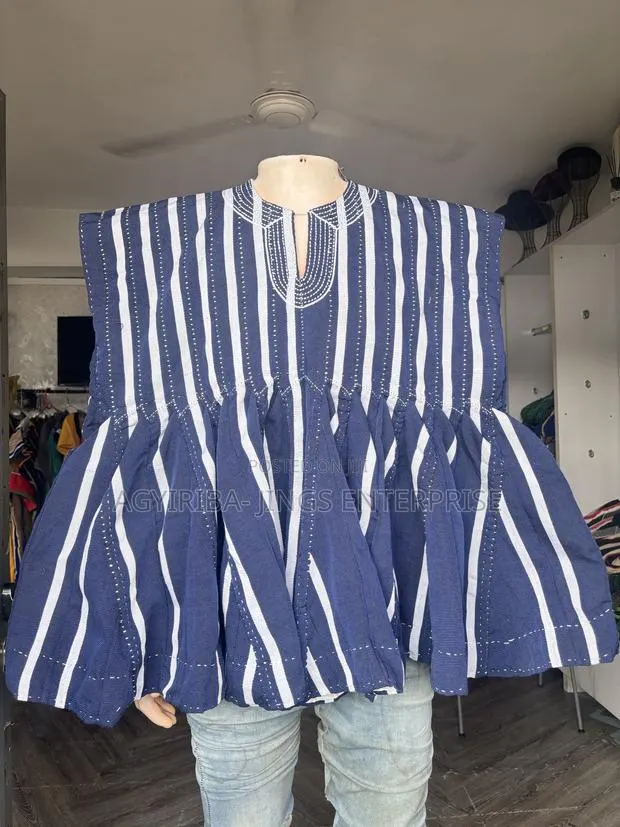 Blue and White Sleeveless Top · Photo 1