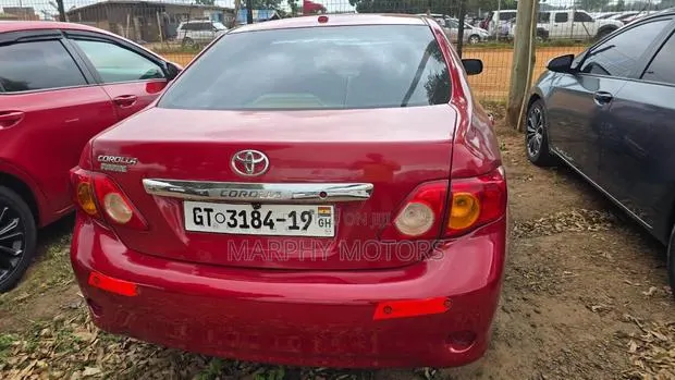 Toyota Corolla 2010 Red · Photo 1