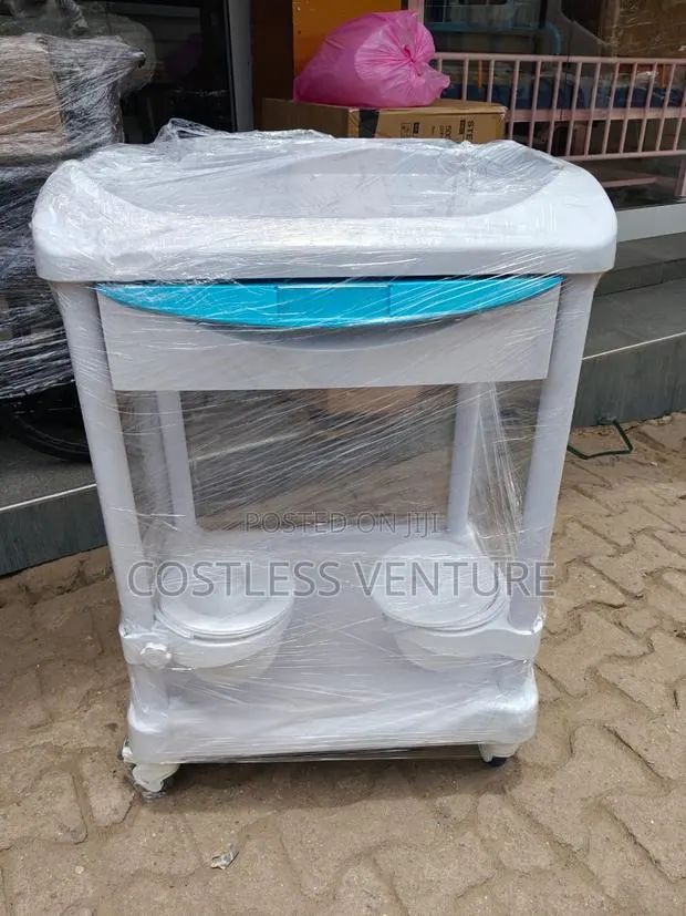 Ingot 2-Tier Treatment Cart With Drawer and 2 Bowls · Photo 1