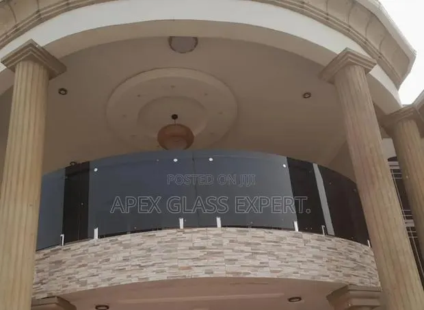 Curved Glass for Balcony With Spigot Support System. · Photo 1