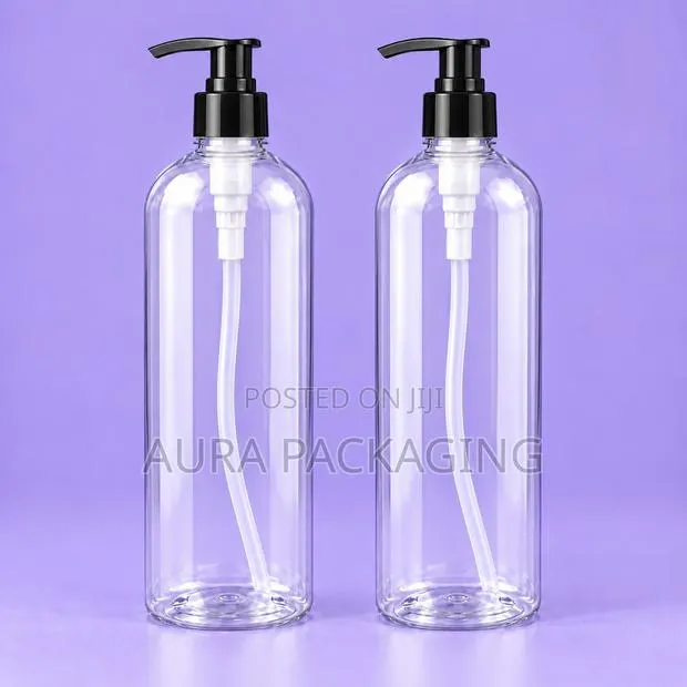 Clear Lotion and Shampoo Bottles With Black Pump · Photo 1
