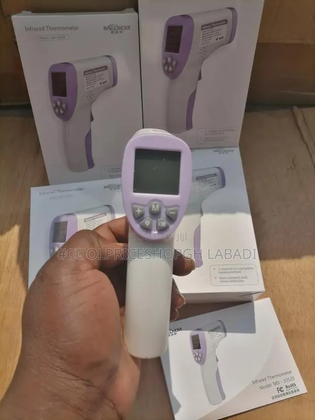 Thermometer Gun Forehead Body Temperature · Photo 1