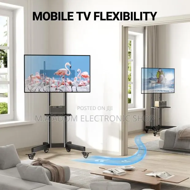 Tv Stand for TVS Between 32”-70” · Photo 1