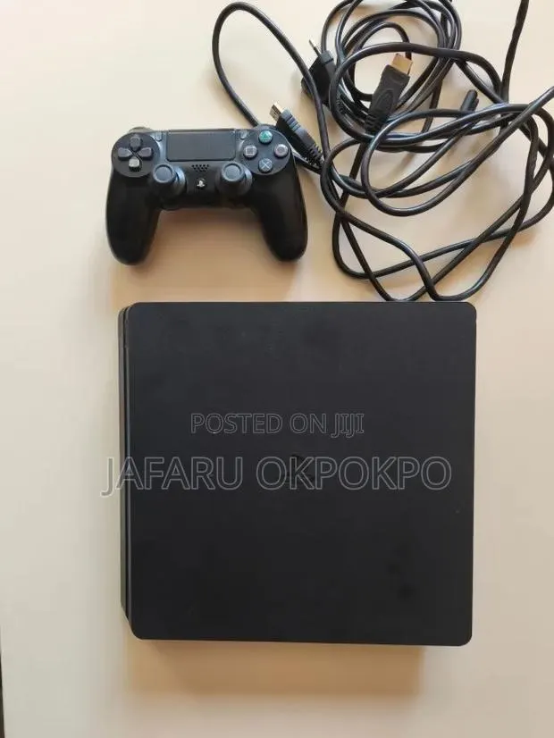 PlayStation 4 With All Accessories(2 Pad) and 4 Installed Games · Photo 1