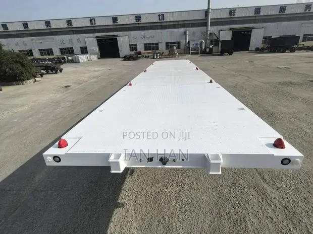 Factory New 3 Axles Flatbed Trailer · Photo 1