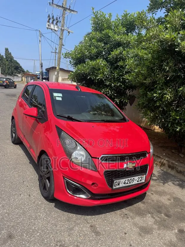 Chevrolet Spark 1LT 4dr Hatchback (1.2L 4cyl 5M) 2015 Red · Photo 1