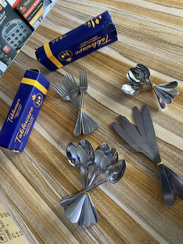 24 Pieces Silver Stainless Steel Cutlery Set · Photo 1