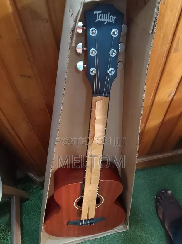 Taylor Acoustic Guitar · Photo 1