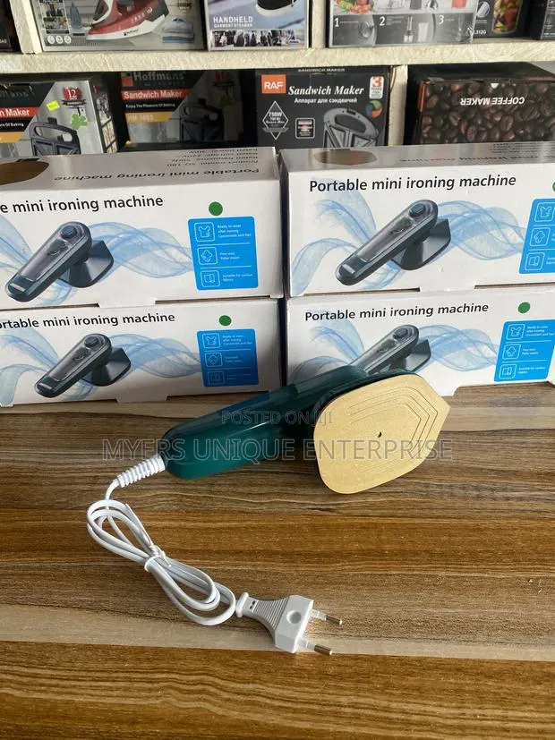 Portable Mini Steam Iron,Best for Quick Touch Ups and Small Spaces · Photo 1