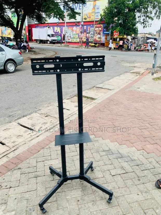 Mobile TV Stand With Wheels for 32-70 Inch Tvs(Black). · Photo 1