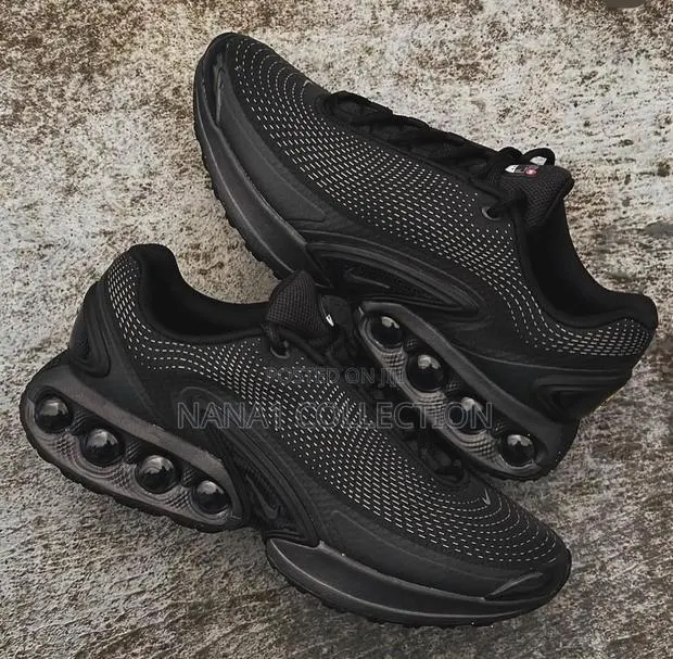 Nike Air Max DN “All Black” Sneakers · Photo 1