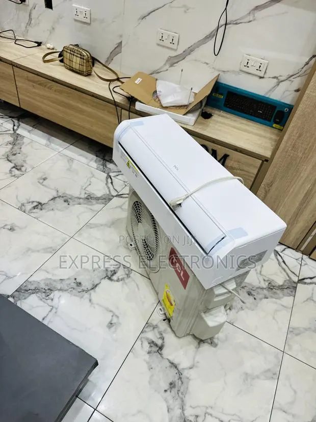 Text Us Fir Your TCL Ac 1.5hp · Photo 1