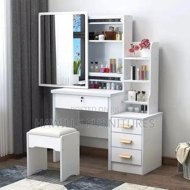 Modern White Dressing Vanity Set Featuring a Sliding Mirror. · Photo 1