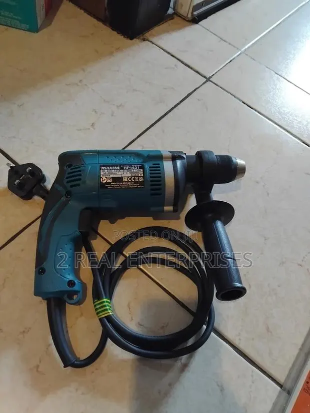 Makita Corded 710w Percussion (Hammer) Drill · Photo 1