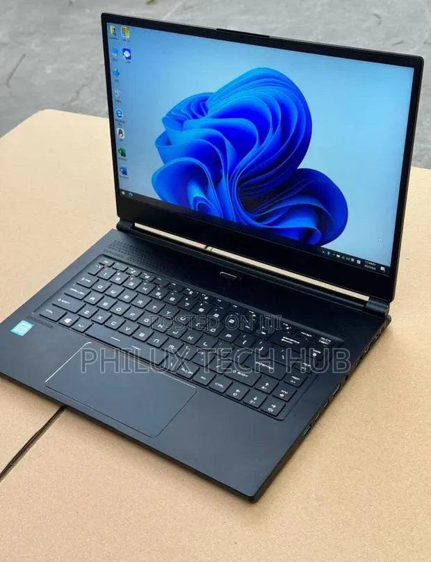 Laptop MSI GS65 Stealth Thin 8RE 16GB Intel Core I7 SSD 512GB · Photo 1
