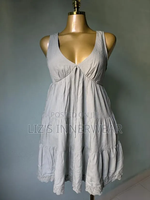 Sleeveless, Tiered Mini Dress · Photo 1
