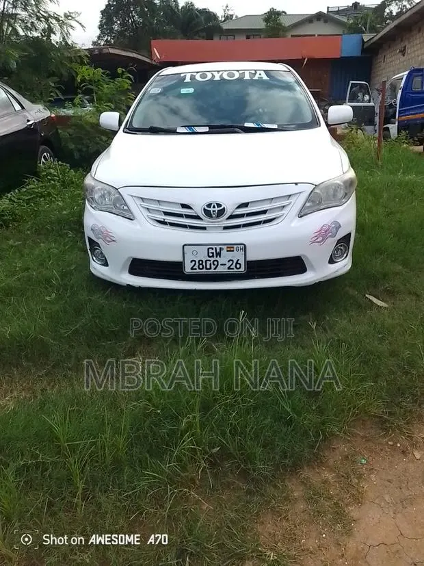 Toyota Corolla 2016 White · Photo 1