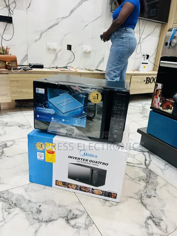 Limited Stock Midea 30L Solo Microwave (EM9P032MO-B)900W Countertop · Photo 1
