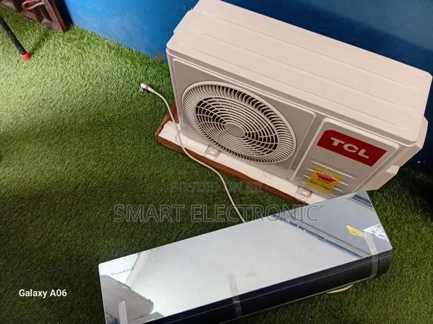 TCL 1.5hp Energy Efficient Mirror Inverter Ac · Photo 1