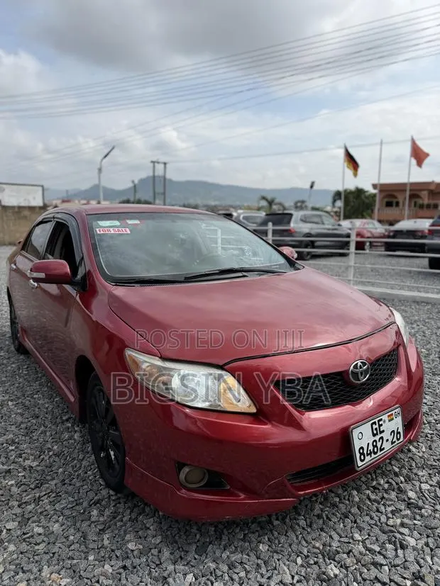Toyota Corolla Base 4dr Sedan (1.8L 4cyl 5M) 2010 Red