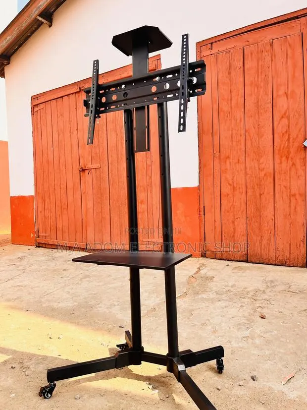 Universal Rolling TV Cart Fits Most 32” – 70” LED LCD Tvs · Photo 1