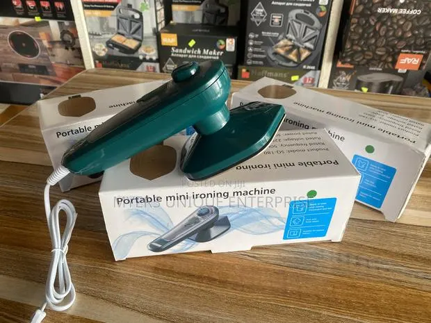 Mini Steam Iron Suitable for Various Fabrics · Photo 1