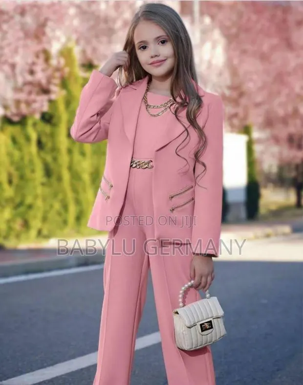 4 Piece Pink Suit or Jumpsuit · Photo 1