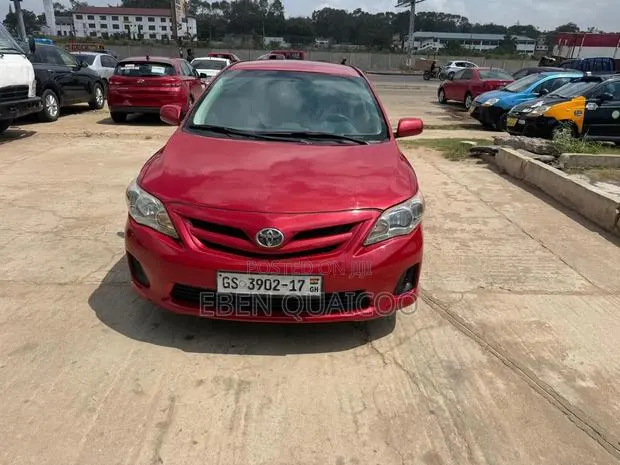 Toyota Corolla 2012 Burgundy · Photo 1