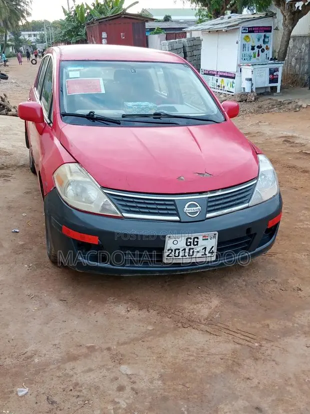 Nissan Versa 1.6 2010 Red · Photo 1