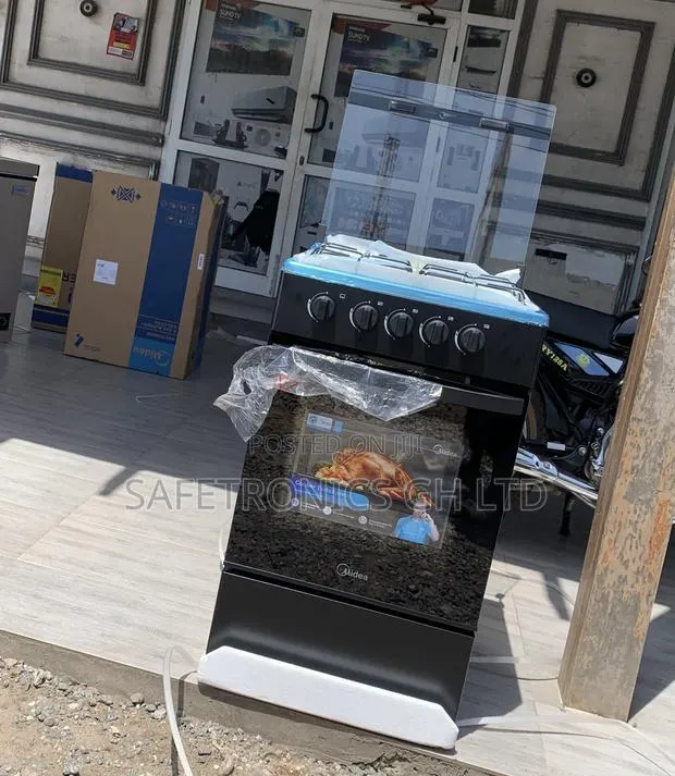 Exclusive Black Midea 4 Burner Gas Cooker · Photo 1