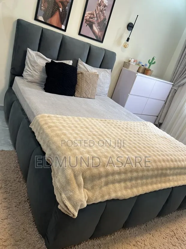 Slightly Used King Size Mattress With Bed Frame and a Side Carbinet · Photo 1