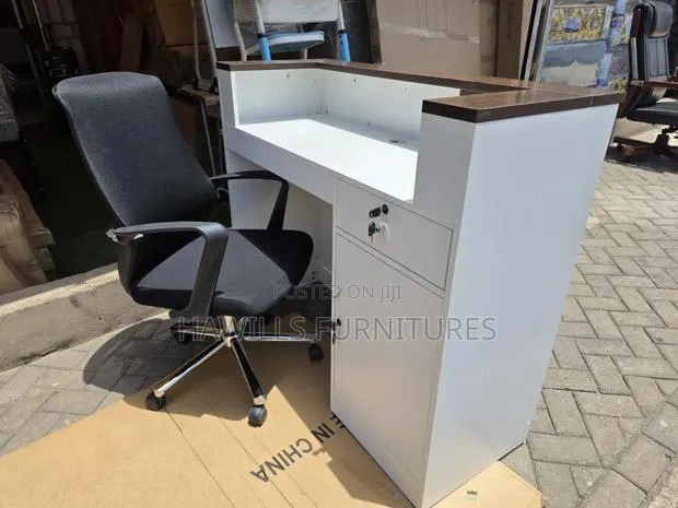 Modern Receptionist Desk Features a White Body and Dark Walnut Panels · Photo 1