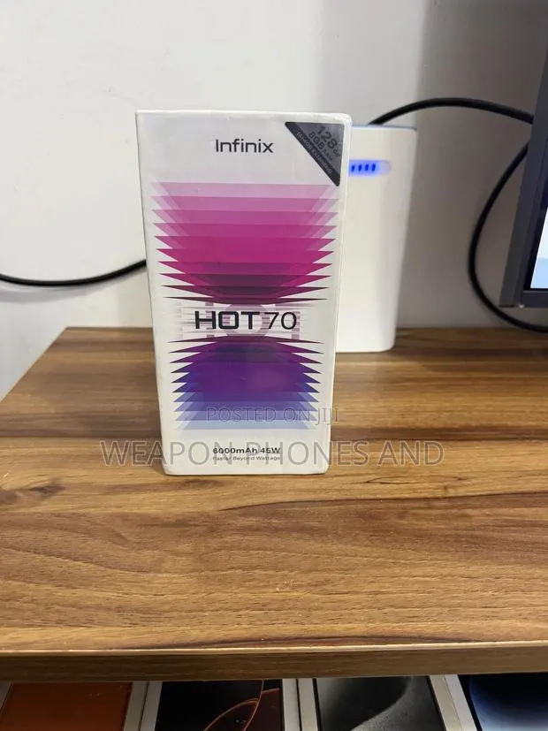 New Infinix Hot 70 128 GB Silver · Photo 1