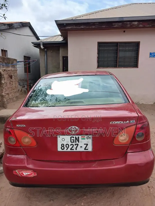 Toyota Corolla 2006 Red · Photo 1