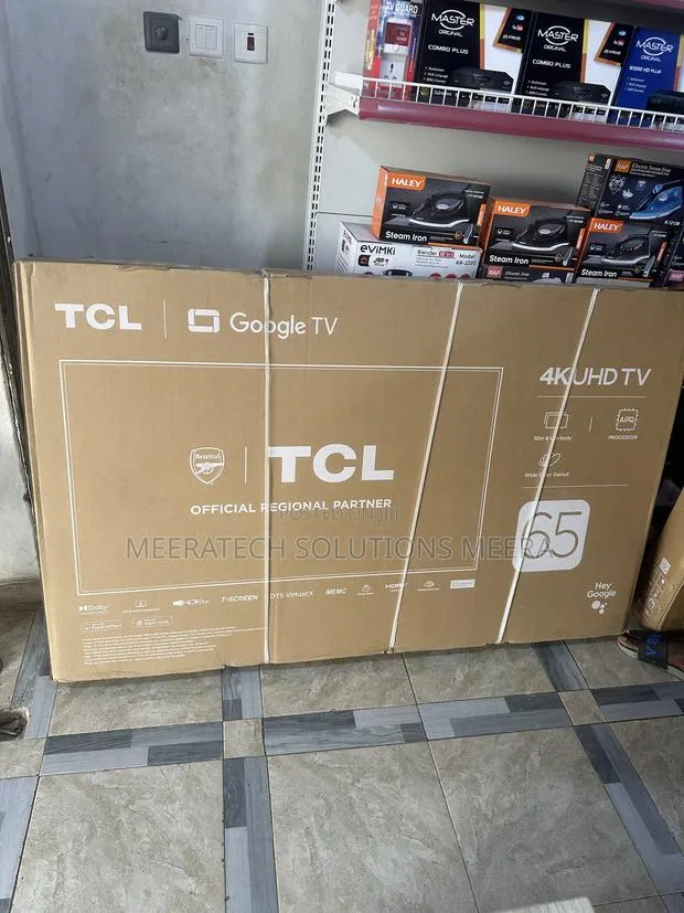 TCL 65” Inches 4KUHD Smart TV · Photo 1
