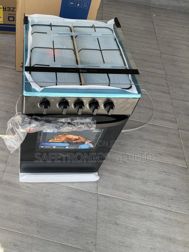 Ultra Best Midea 4-Burner Gas Cooker Oven Grill · Photo 1
