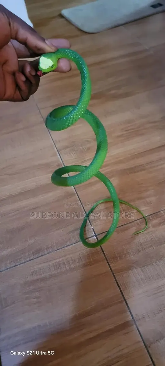 Realistic Green Rubber Snake · Photo 1