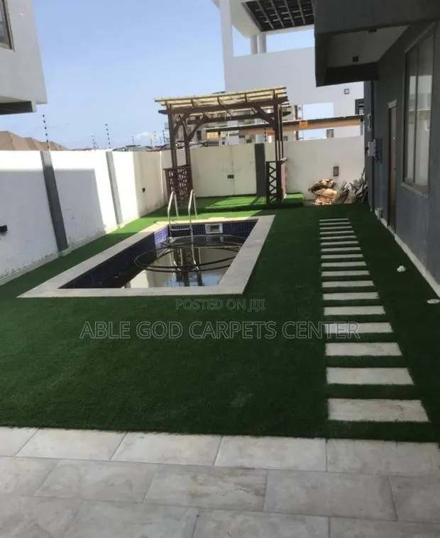 Quality Green Grass for Pool Side and Compound · Photo 1