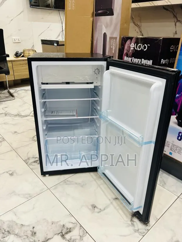 Fast Cooling Nasco Nasf1-110fl 1 Door Table Top Fridge(Black) · Photo 1