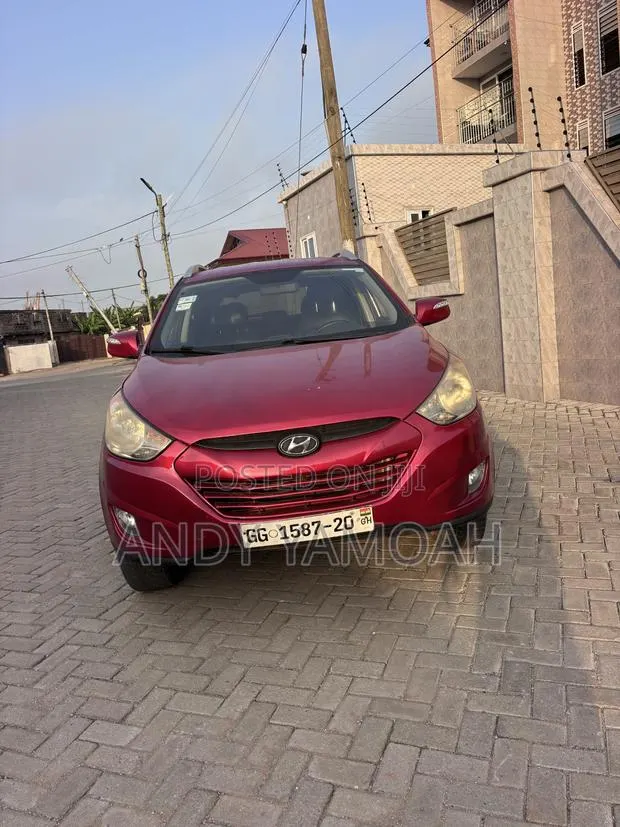 Hyundai Tucson 2013 Red · Photo 1