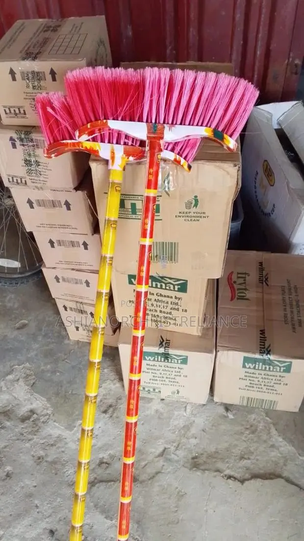 Standing Brooms and Mops · Photo 1